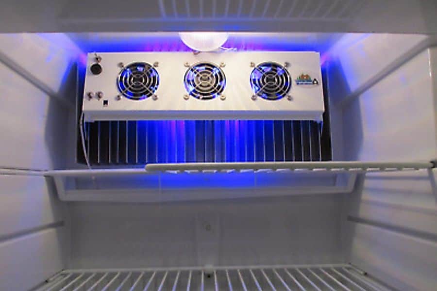 Place Small Fan in RV Fridge to aid cooling