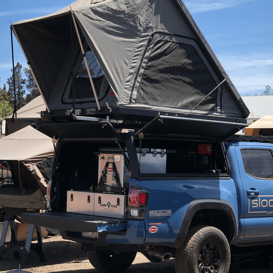 12 Of the Best Small Truck Campers On the Market Right Now 13 Camp King Outback Series Camper Open Panel