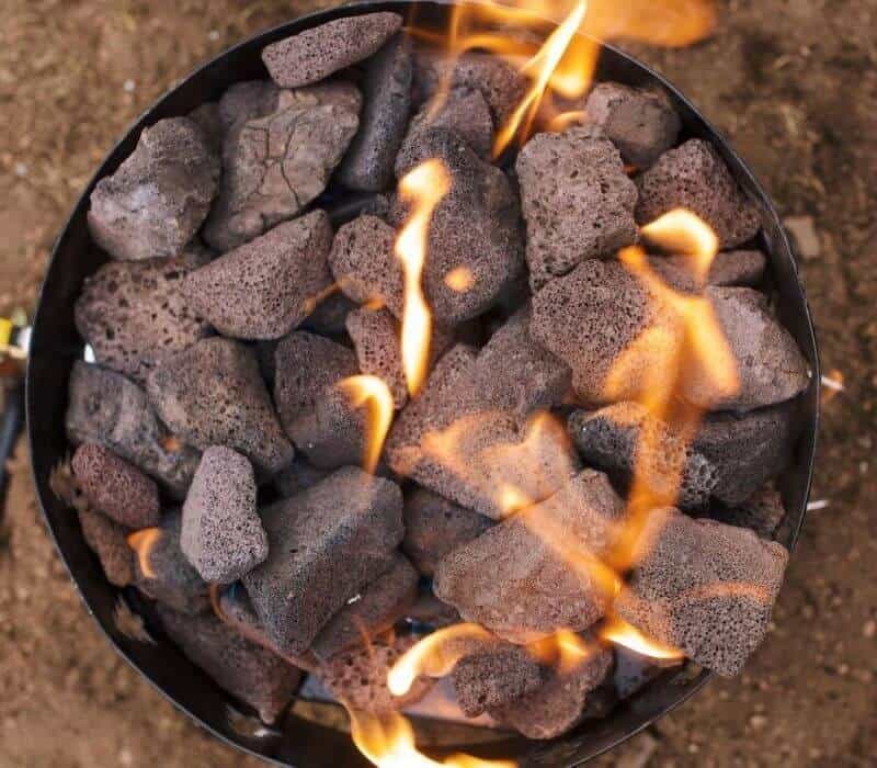 Should I Choose A Fire Pit With Fake Logs Or Lava Rocks_ (1) Should I Choose A Fire Pit With Fake Logs Or Lava Rocks_ (1)