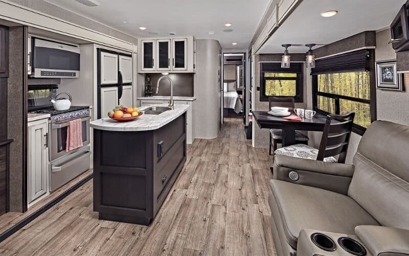 travel trailer with kitchen island and bunkhouse