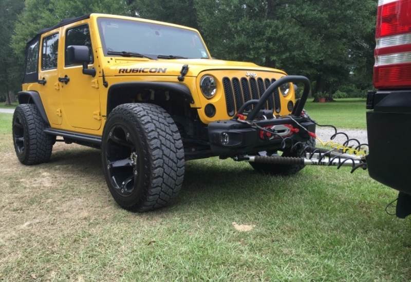 What Jeep Models Can Be Flat Towed Behind An RV? 2 Install-A-Heavy-Duty-Tow-Bar-On-The-Jeep