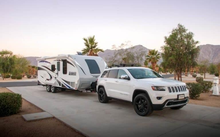 Tow-ready crossover SUV preparing to haul a small RV or camper trailer