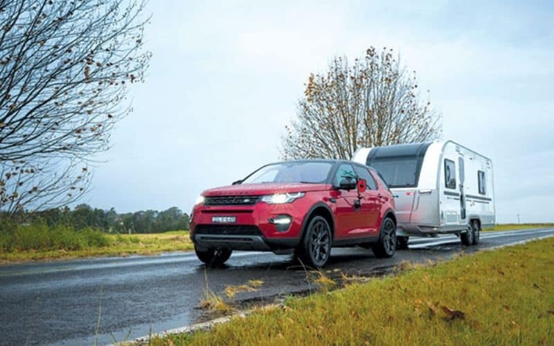 6 Best Crossover SUVs For Towing An RV In 2022 7 Land-Rover-Discovery-Sport-Towing-RV