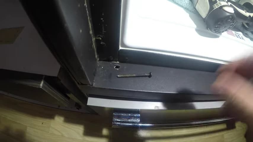Remove The Screws Holding The Refrigerator 
