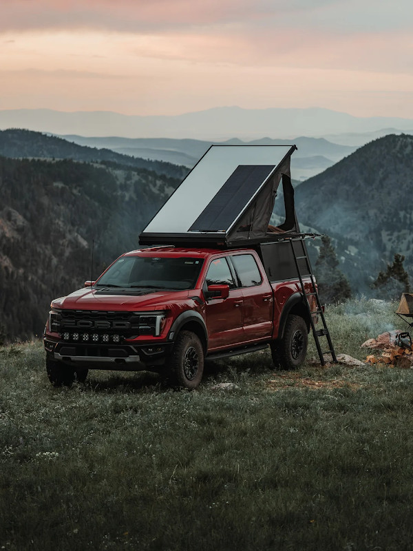 Top 7 Amazing Truck Campers For The Toyota Tacoma 5 GFC Platform Camper wedge with solar panel mounted on a pickup truck