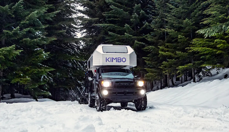 Top 7 Amazing Truck Campers For The Toyota Tacoma 6 Kimbo 6 hard-sided truck camper on a Toyota truck in the snow